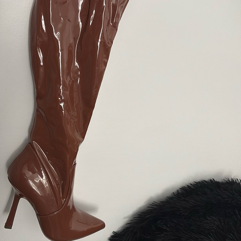 Steve Madden Camel color thigh length boots brand new never worn .